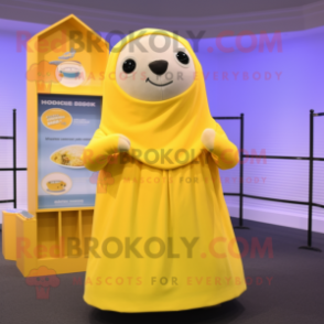 Lemon Yellow Seal mascot costume character dressed with a Capri Pants and Shawl pins