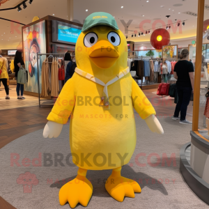 Yellow Penguin mascot costume character dressed with a Henley Tee and Earrings