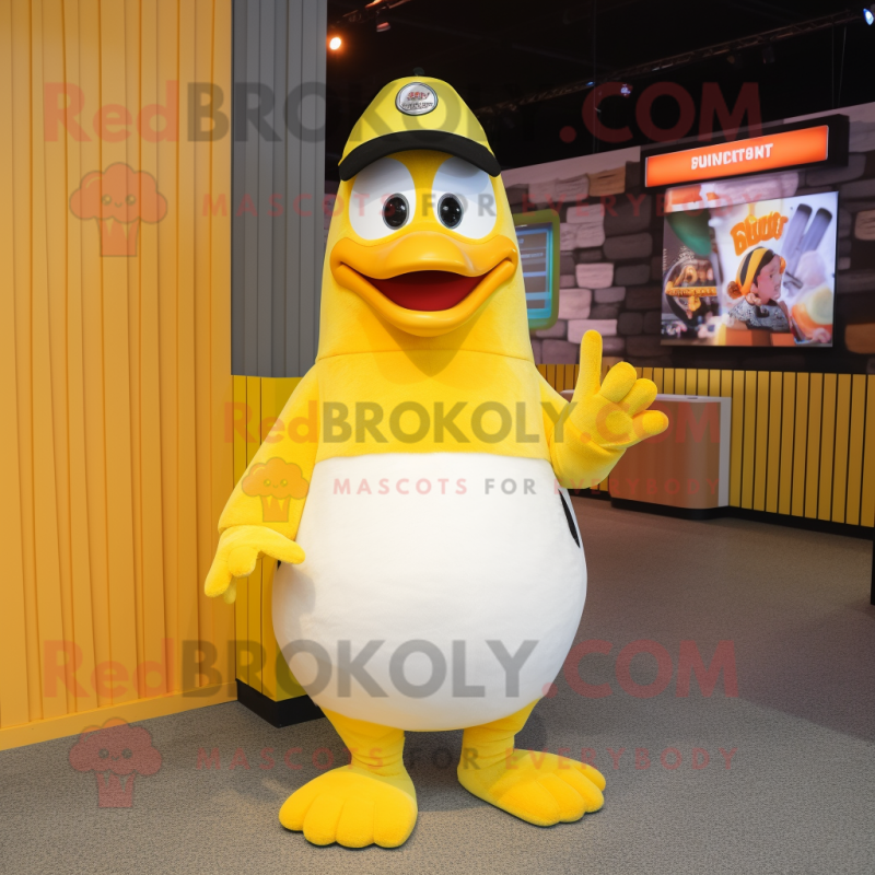 Yellow Penguin mascot costume character dressed with a Henley Tee and Earrings