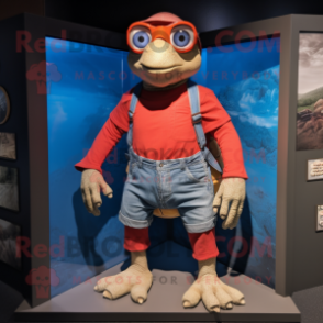 Red Turtle mascot costume character dressed with a Denim Shorts and Brooches