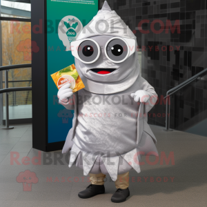 Silver Fish Tacos mascot costume character dressed with a Parka and Reading glasses