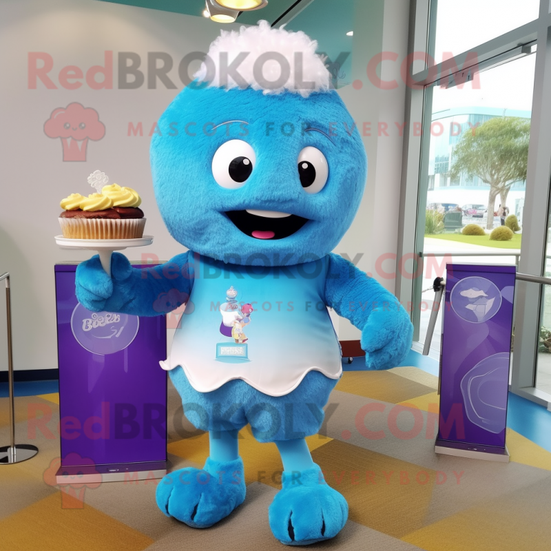 Sky Blue Cupcake mascot costume character dressed with a Bermuda Shorts and Watches Sky Blue Cupcake mascot costume character dressed with a Bermuda Shorts and Watches