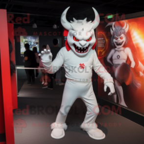 White Devil mascot costume character dressed with a Graphic Tee and Ties