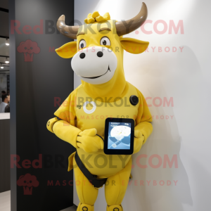 Yellow Zebu mascot costume character dressed with a T-Shirt and Smartwatches