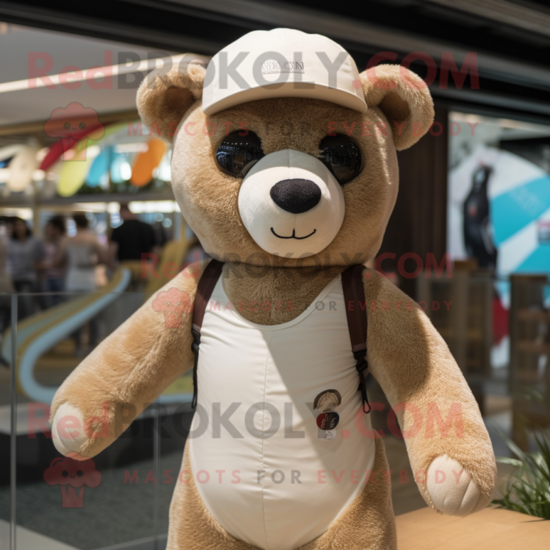 Beige Teddy Bear mascot costume character dressed with a Swimwear and Beanies Beige Teddy Bear mascot costume character dressed with a Swimwear and Beanies