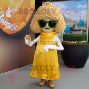 Gold Falafel mascot costume character dressed with a Mini Dress and Sunglasses