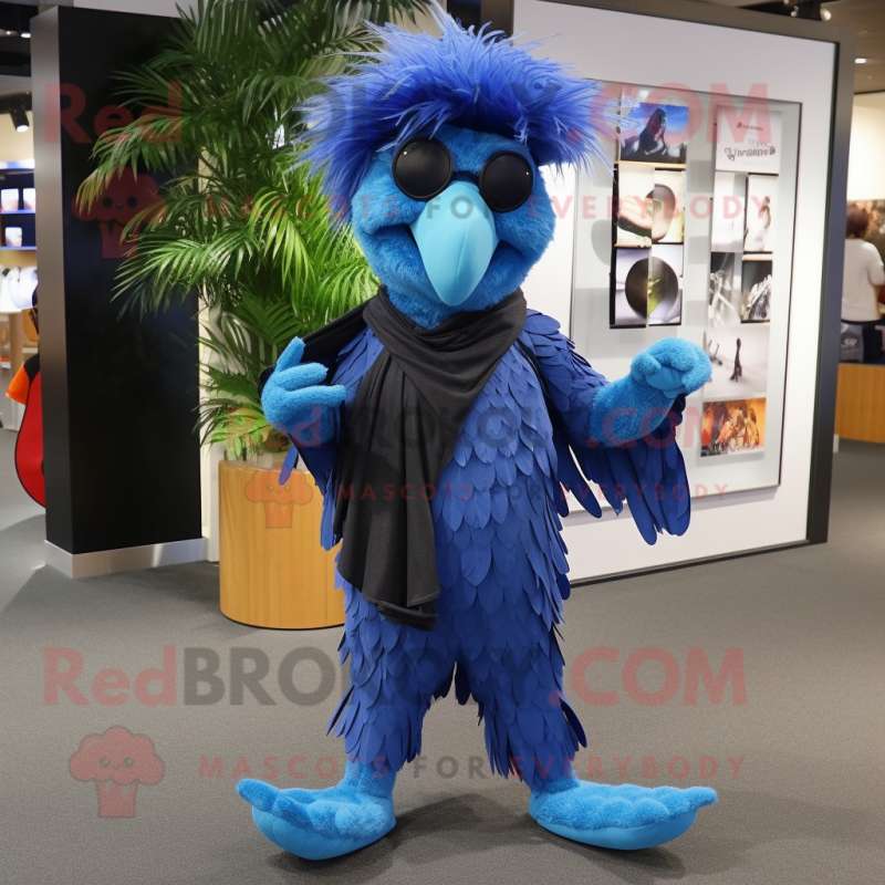 Blue Harpy mascot costume character dressed with a Bootcut Jeans and Caps