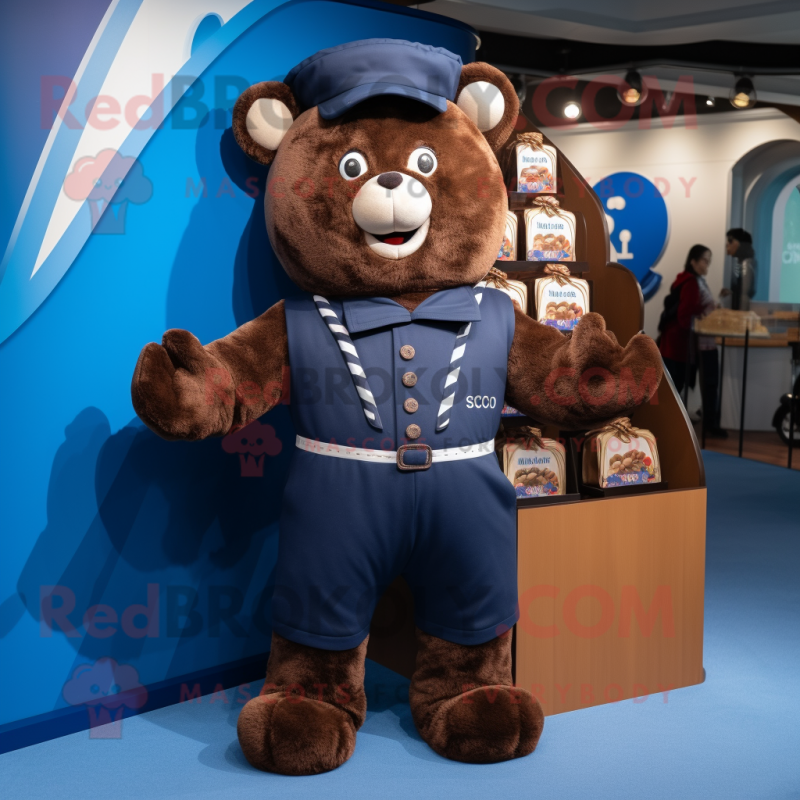 Navy Chocolates mascot costume character dressed with a Dungarees and Handbags Navy Chocolates mascot costume character dressed with a Dungarees and Handbags