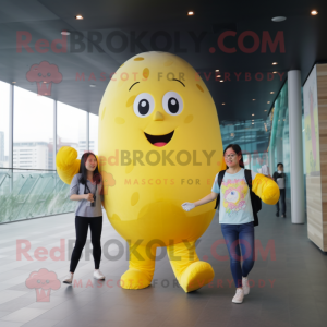 Lemon Yellow Potato mascot costume character dressed with a Mom Jeans and Foot pads