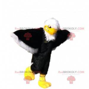 Mascotte d'aigle noir, blanc et jaune, costume de vautour -