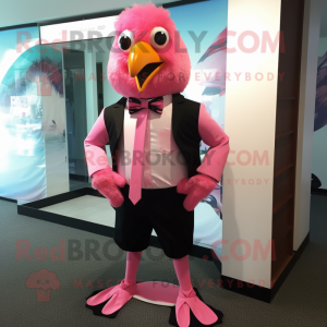 Pink Blackbird mascot costume character dressed with a Bermuda Shorts and Bow ties