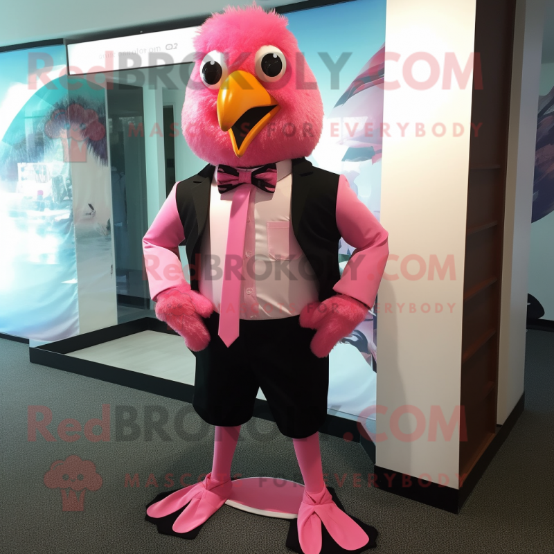 Pink Blackbird mascot costume character dressed with a Bermuda Shorts and Bow ties Pink Blackbird mascot costume character dressed with a Bermuda Shorts and Bow ties