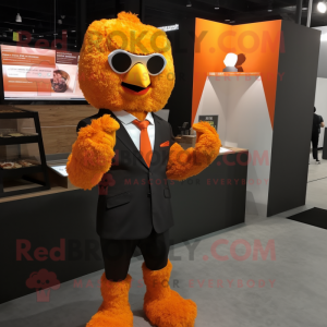 Orange Fried Chicken mascot costume character dressed with a Suit Jacket and Gloves
