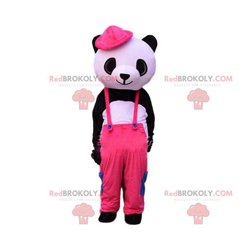 Sort og hvid panda maskot klædt i lyserøde overalls -