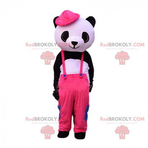 Sort og hvid panda maskot klædt i lyserøde overalls -