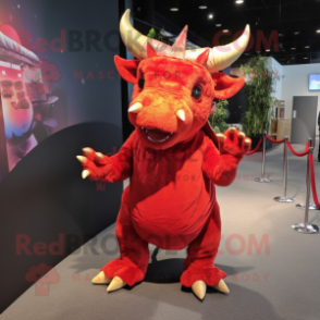 Red Triceratops mascot costume character dressed with a Cover-up and Hair clips