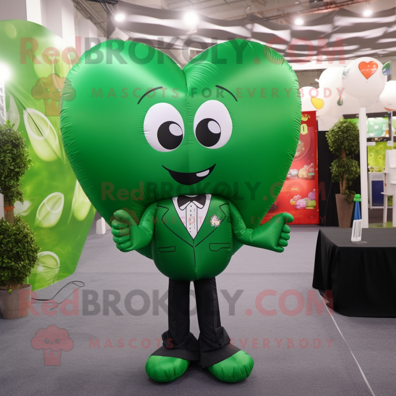 Forest Green Heart Shaped Balloons mascot costume character dressed with a Dress Pants and Coin purses Forest Green Heart Shaped Balloons mascot costume character dressed with a Dress Pants and Coin purses