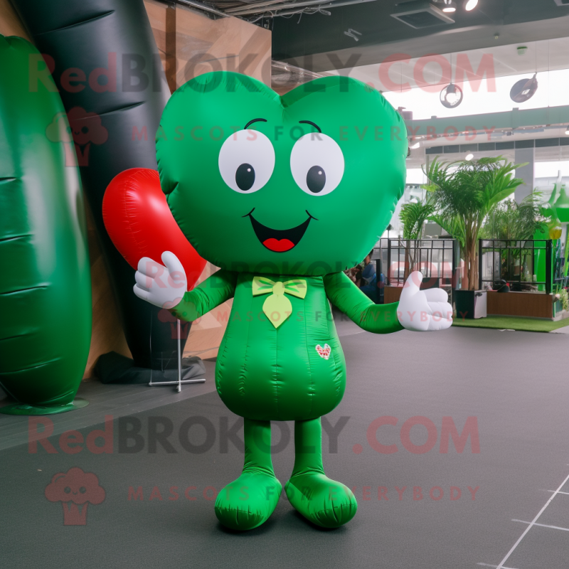 Forest Green Heart Shaped Balloons mascot costume character dressed with a Dress Pants and Coin purses