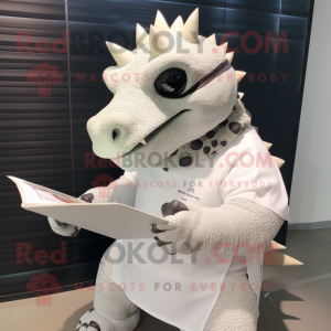 White Ankylosaurus mascot costume character dressed with a Long Sleeve Tee and Reading glasses