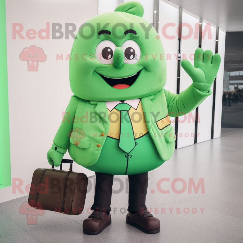 Green Croissant mascot costume character dressed with a Suit Jacket and Briefcases Green Croissant mascot costume character dressed with a Suit Jacket and Briefcases