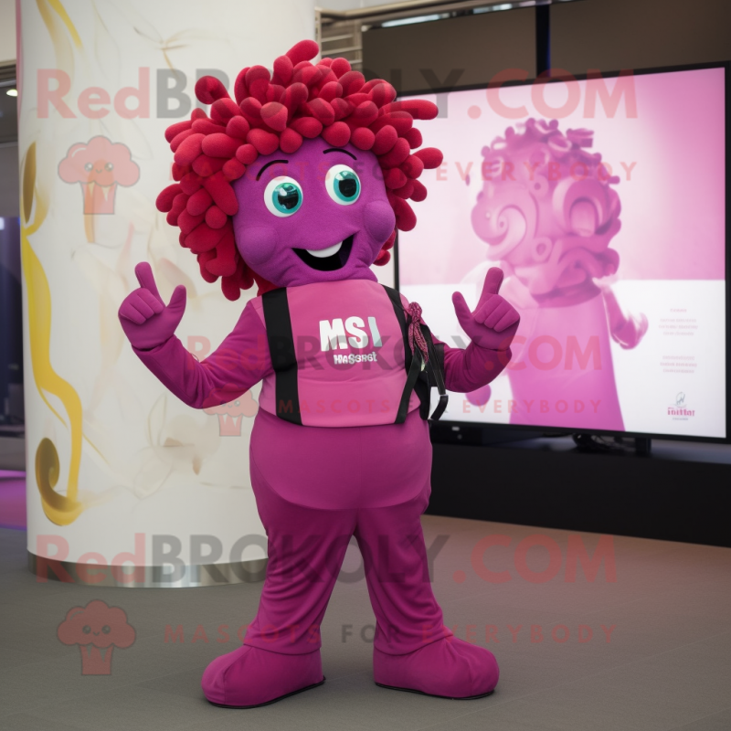 Magenta Medusa mascot costume character dressed with a Waistcoat and Smartwatches Magenta Medusa mascot costume character dressed with a Waistcoat and Smartwatches