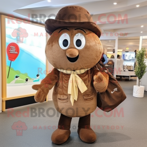 Brown Bagels mascot costume character dressed with a Overalls and Handbags