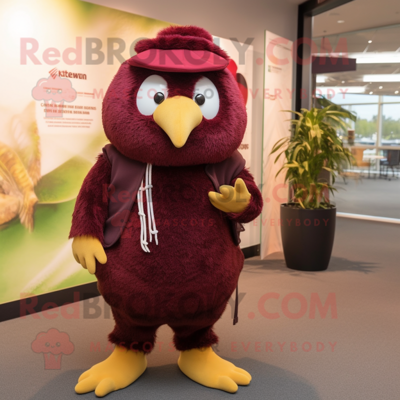 Maroon Kiwi mascot costume character dressed with a Overalls and Shawl pins