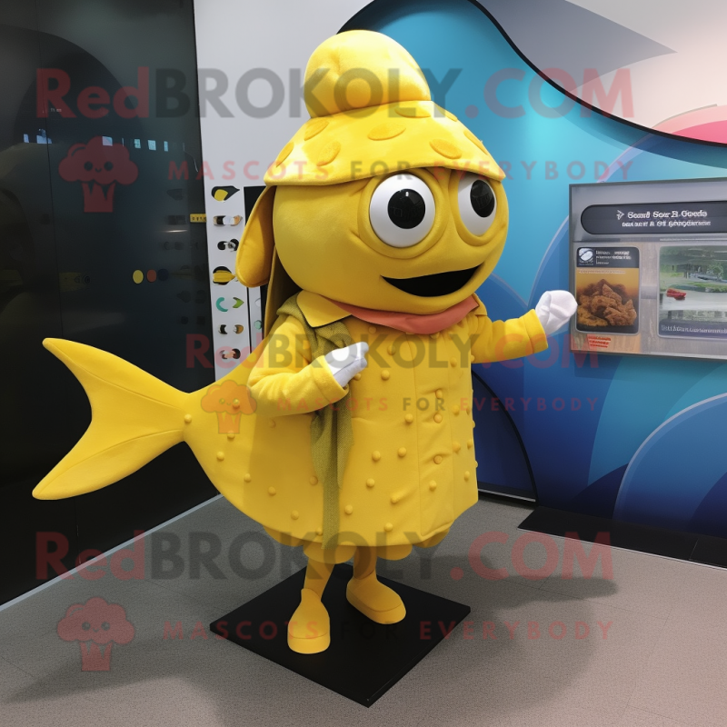 Yellow Tuna mascot costume character dressed with a Coat and Clutch bags Yellow Tuna mascot costume character dressed with a Coat and Clutch bags