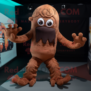 Brown Kraken mascot costume character dressed with a T-Shirt and Gloves