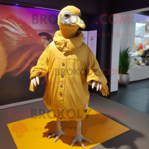 Gold Guinea Fowl mascot costume character dressed with a Windbreaker and Wraps