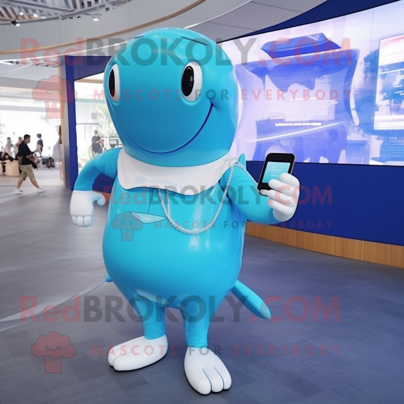 Cyan Humpback Whale mascot costume character dressed with a Bodysuit and Smartwatches