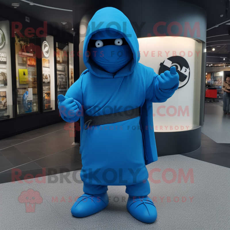 Blue Ninja mascot costume character dressed with a Parka and Shawl pins