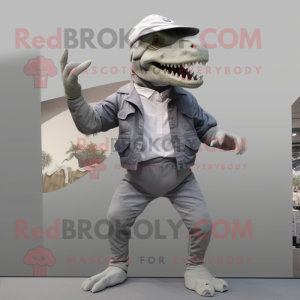 Gray Tyrannosaurus mascot costume character dressed with a Capri Pants and Berets