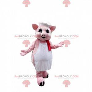 Rosa grismaskot klädd i ett förkläde med en kockhatt -