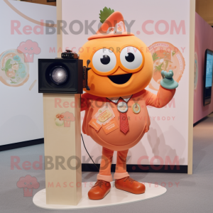 Peach Camera mascot costume character dressed with a Graphic Tee and Lapel pins