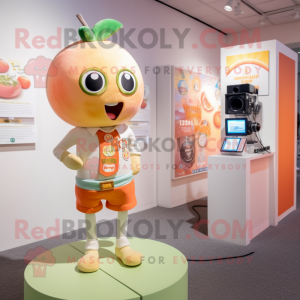 Peach Camera mascot costume character dressed with a Graphic Tee and Lapel pins