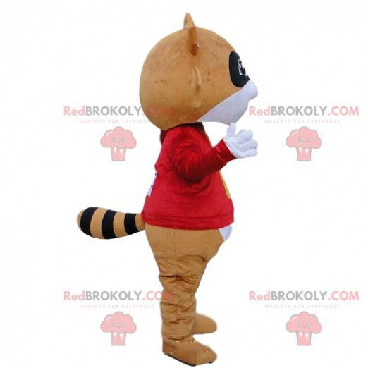 Mascota de mapache marrón y blanco con un traje rojo -