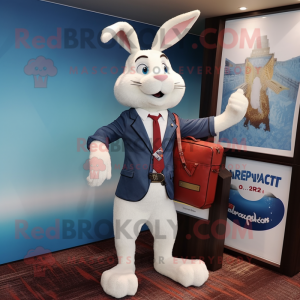 White Rabbit mascot costume character dressed with a Blazer and Messenger bags
