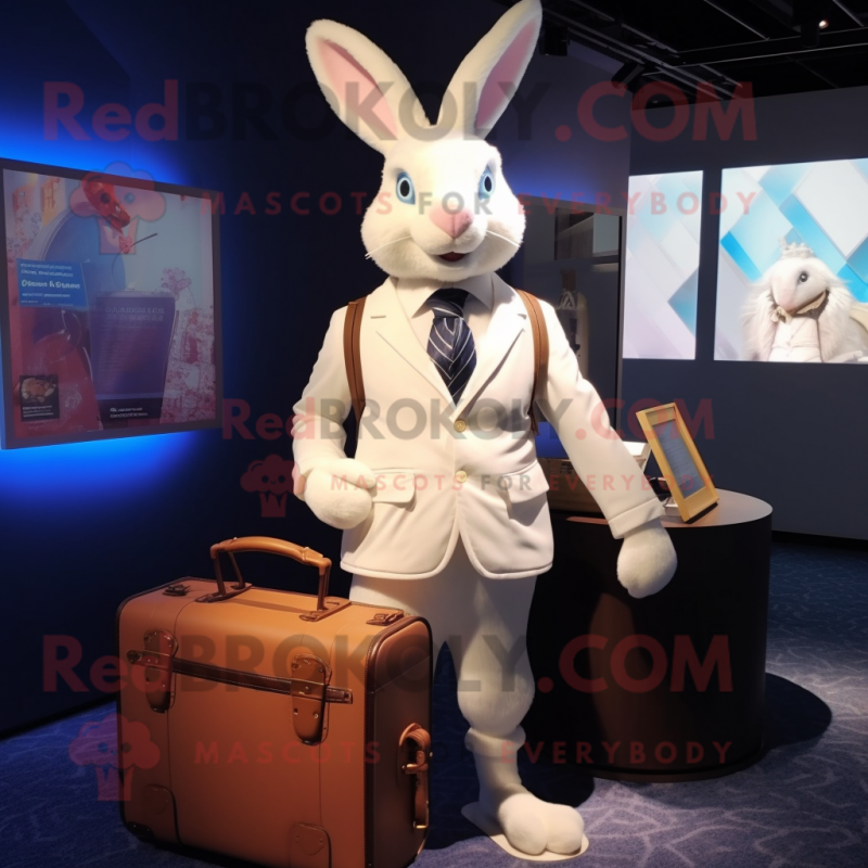 White Rabbit mascot costume character dressed with a Blazer and Messenger bags