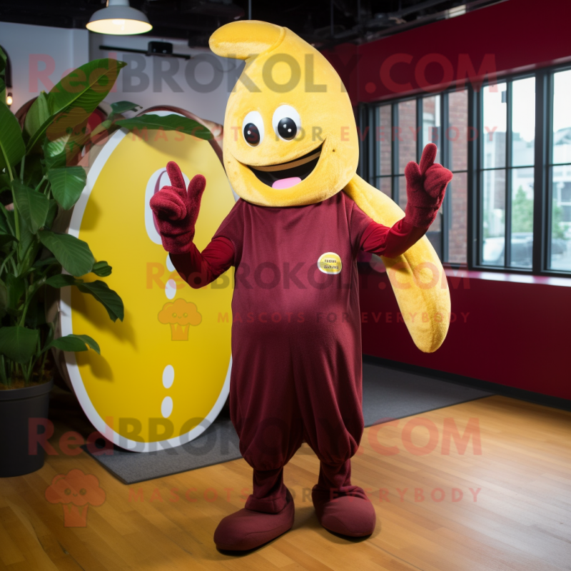 Maroon Banana mascot costume character dressed with a Playsuit and Beanies