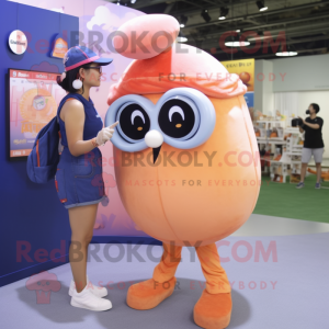 Peach Human Cannon Ball mascot costume character dressed with a Denim Shorts and Reading glasses