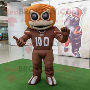 Brown American Football Helmet mascot costume character dressed with a Suit Pants and Foot pads