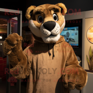 Brown Mountain Lion mascot costume character dressed with a Jumpsuit and Headbands