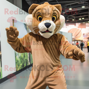 Brown Mountain Lion mascot costume character dressed with a Jumpsuit and Headbands