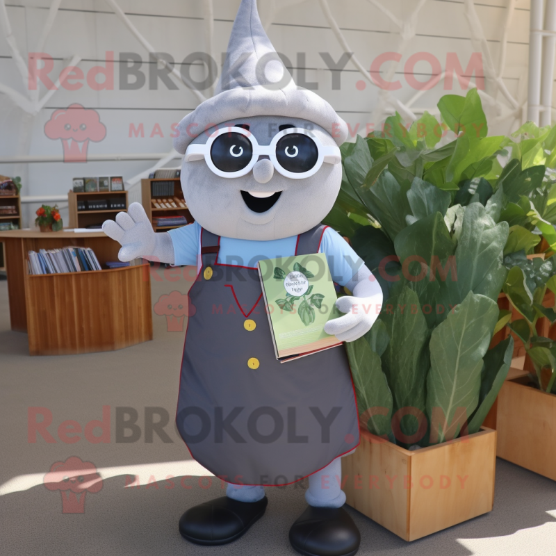 Silver Radish mascot costume character dressed with a Dungarees and Reading glasses Silver Radish mascot costume character dressed with a Dungarees and Reading glasses
