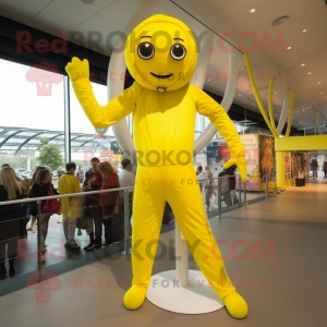Lemon Yellow Trapeze Artist mascot costume character dressed with a Jumpsuit and Gloves