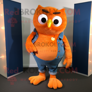 Orange Owl mascot costume character dressed with a Bootcut Jeans and Cufflinks