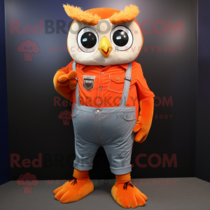 Orange Owl mascot costume character dressed with a Bootcut Jeans and Cufflinks