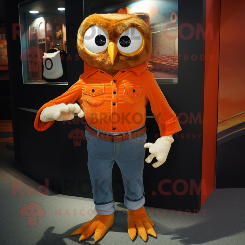 Orange Owl mascot costume character dressed with a Bootcut Jeans and Cufflinks