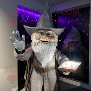 Silver Wizard mascot costume character dressed with a Henley Shirt and Brooches